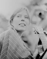 Joni Mitchell at Newport Folk Festival in July 1969. Kris Kristofferson and  James Taylor are pictured here as well. These photos by Diana J. Davies are  from the Ralph Rinzler Folklife Archives