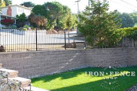 4ft Wrought Iron Fence Acting As A Safety Barrier On Top Of A Wall Drop Off Lake Houses Exterior Iron Fence Wrought Iron Fences
