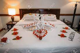Below are popular events and reasons for ordering a floral arrangement for someone staying at a hotel. Bed Decorated With Flowers And Towels In Hotel Room Stock Photo Picture And Royalty Free Image Image 98051556
