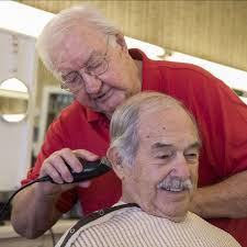 Jimmy Post celebrates 50 years cutting hair in Cobb barbershop