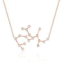 Each necklace represents a unique zodiac star formation and is crafted with delicate crystals and a gold finish. Sagittarius Constellation Necklace