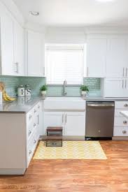 14 Times White Kitchen Cabinets Transformed A Space Unique Kitchen Backsplash Modern White Kitchen Cabinets White Kitchen Design