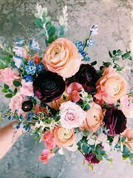 Plan your reception details like wedding napkins and cups. Spring Wedding Flowers Moody Spring Wedding Bouquets Spring Purple Wedding Bouquets Purple Wedding Flowers