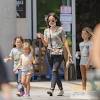 She stands 5 feet 4 inches or 1.63 m (163 cm) tall and weighs a mere 115 pounds or 52 kg. 3