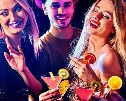 lively bar or club in Freeport, Bahamas, with people dancing and enjoying drinks