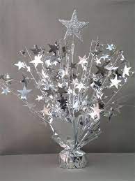 A wedding themed around the magic of stars. Silver Star Table Centerpiece Doolins