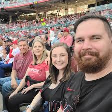 Can someone remove the black jacket from my photo?