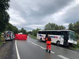 A bus collided with a passenger car on the national road no. Warfih3r28rbnm