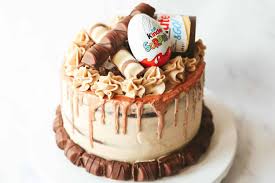 Here at sweet art creations i pride myself in bringing your ideas into edible art using all quality ingredients. Kinder Bueno Cake With Gold Drip