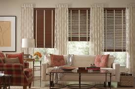 Faux Dark Wood Blinds With Cloth Tape By Lafayette Interior Fashions Fidelis Wood Blinds Living Room Windows Living Room Blinds Window Treatments Living Room