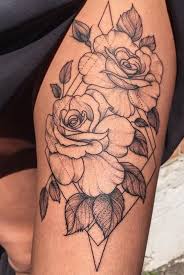 The tattoo has been nicely crafted to appear as if growing from within the leg. 30 Trending Thigh Tattoo Ideas Mybodiart