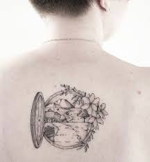 It can correspondingly be drawn on one side of the back or at the back of the ear like in this image. 25 Prettiest Tattoos That Are Worth The Pain Society19