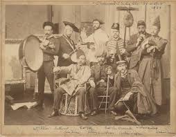 Samuel Isham, seated at left with other artists in 1889.
