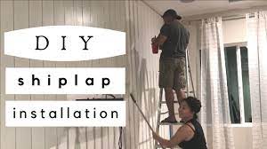 How to use wood paneling to add loftiness to a room. Diy How To Install Vertical Shiplap Youtube