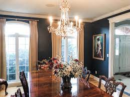 Wood is used as the main material to handle the flooring and all pieces of furniture which gives a warmer contrast and natural nuance inside the room. Dining Room Navy Blue Almost Black Sherri Blum