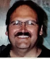 Thomas M. Rohan (1954-2012)