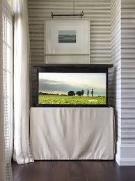 This tv cabinet is powerful, easy to store, and led lights make life more colorful. Hidden Flatscreen Tv Cabinet Contemporary Living Room Hickman Design Associates