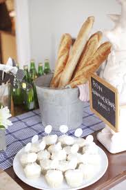 Find a french playlist to put on the in background. French Theme Party In Paris Love The Baguette In The Tin As Decoration French Party French Dinner Parties Parisian Party