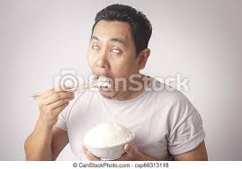 Methods 1 using chopsticks to eat rice 2 learning general chopstick technique so you've mastered eating meats, vegetables, and sushi with chopsticks, but still find yourself. Asian Man Eating Rice Portrait Of Good Looking Asian Young Man Enjoys A Cup Of White Rice Canstock