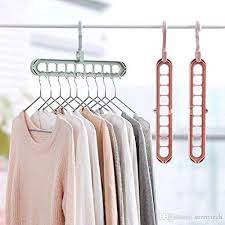 Check spelling or type a new query. Premsons Multi Functional Clothes Hanger Holder Portable Anti Slip Storage Rack Space Saving Hook For Garment Drying Colours May Vary Pack Of 1 Buy Online In Guernsey At Guernsey Desertcart Com Productid 147094734