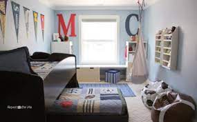 Boy's bedroom baseball locker instead of single hook, use the bat with baseball letters and add hooks. Boring To Bold Boys Sports Themed Bedroom Repeat Crafter Me