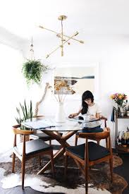 Cowhide Rug Under Dining Simple Round Table Affordable Home Decor Modern Dining Room Mid Century Dining Room
