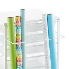 Give each shelf a category. White Elfa Gift Wrap Organizer The Container Store