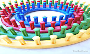 Wrap another loop in the same fashion around the next stick. Loom Size Hat Size And Number Of Rows