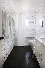 Black And White Penny Tile Bathroom Jenny Wolf Black And White Kids Bathroom With Green Accents Features Ceiling Clad In Coronata St Bathroom Floor Tiles Penny Tiles Bathroom Penny Tile Floors