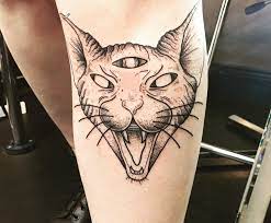 The meaning of cats eye tattoo relates to beauty and afterlife. My New Three Eyed Sphinx Cat By Charlotte Lee At Skullduggery Tattoo Belfast Tattoos