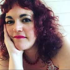 This is Sally! She goes by she/her pronouns. Sally is a scientist by day  and vocal hellion by night. Also a pianist and bass player, Sally's  favorite composers are Chopin and Glass.