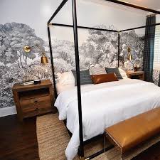 This bed has dramatic turnings on the bed makes a strong design statement, capped by a collared metal canopy frame in a burnished sauternes finish. Frame Black Metal Canopy Bed Cb2 In 2021 Metal Canopy Bed Black Metal Canopy Bed A Frame Cabins