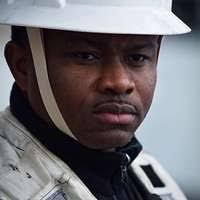 Damage Controlman 3rd Class Adrian Grey, from East Orange, N.J., resets an  alarm in damage control central aboard the multipurpose amphibious assault  ship USS Iwo Jima (LHD 7)