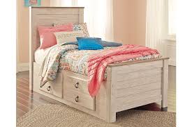 The drawers can be positioned on either the right or left side of the bed to accommodate any room layout, no matter how small.wood slats positioned. Willowton Twin Panel Bed With 2 Storage Drawers Ashley Furniture Homestore