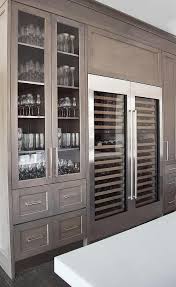 Love The Gray Washed Cabinets And Glassware Storage Side By Side Wine Coolers Stunning Kitchen Design Fro Contemporary Kitchen Home Kitchens Kitchen Remodel