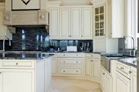 White kitchen cabinet with black countertop. 36 Inspiring Kitchens With White Cabinets And Dark Granite Pictures Home Stratosphere