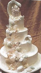 Writing in chocolate takes some skill and lots of practice. Seashell Wedding Cakes