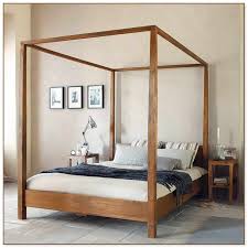Sharp angles, straight lines and light to dark woods characterize modern style bed. Wood Canopy Bed Frame Queen