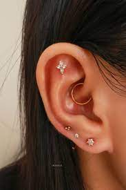 Classy Multiple Cartilage Ear Piercing Ideas Lotus Earring Studs Hoop Rings Www Impuria Com Ear Piercings Cartilage Ear Piercing