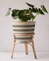 20 Planters So Chic Nobody Will Notice If You Forget To Water The Plants Rattan Planters Affordable Outdoor Furniture Diy Planters Indoor