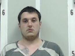 Body found in buried concrete-sealed barrel; northeast Alabama man charged  with murder