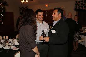 Paul Chapa (right), the founder of Food Industry Serving