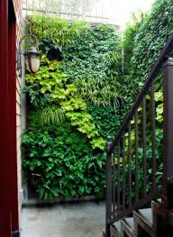 Fake But Idea Filled Green Walls Are The Perfect Solution For Covering An Unsightly Wall Vertical Garden Design Vertical Garden Artificial Vertical Garden