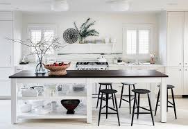 Plain back counter bar stool has a 360deg swivel and mounts directly to floor. Dark Walnut Island Countertop With Backless Black Bar Stools Cottage Kitchen