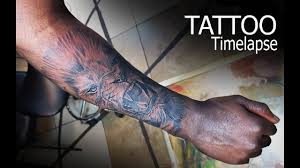 I always recommended choosing an artist that shows your their portfolio and what pieces were done on dark skin. Lion Tattoo On Dark Skin Timelapse Youtube