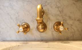 Getaway The Marlton Hotel Nyc The Pursuit Of Style Bathroom Faucet Fixtures Unlacquered Brass Brass Bathroom Faucets