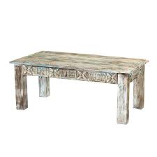 The coffee table can all too often be forgotten under a blanket of newspapers and magazines, covered by the soles of our feet as we recline back into our chairs and discarded as a glorified footrest. Winter White Reclaimed Wood Hand Carved 43 Coffee Table