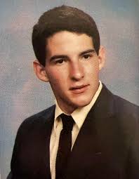 Marvin Wilson is pictured with sons Ben, a senior, and Caden, a sophomore,  prior to the start of a football game in 2024