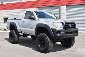 Showing the 2021 toyota tacoma sr 4x2 access cab 6 ft. 2009 Toyota Tacoma 4x4 Lifted Regular Cab Excellent Condition For Sale In Orlando Fl Classiccarsbay Com