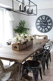 An industrial wedding space with brick walls, wooden chairs, greenery and bright bloom decor, bright blue curtains and ribbons on the chairs. 36 Best Industrial Home Decor Ideas And Designs For 2021